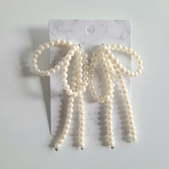 Large Acrylic Pearl Bow Earrings - Picture 1 of 7